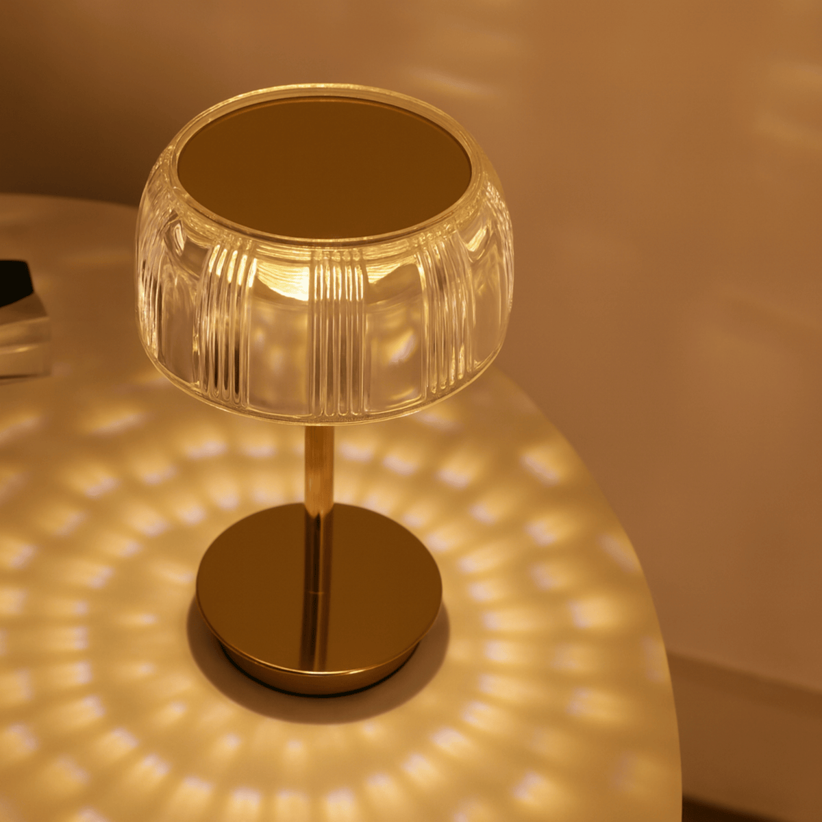 Table lamp with ribbed dome shade and slender stem