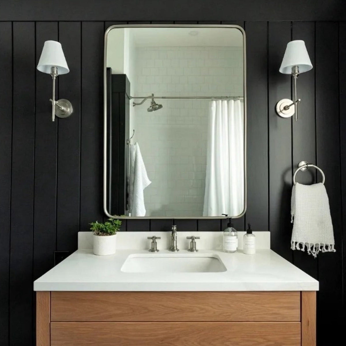 Wall lamp with fabric shade and metal arm