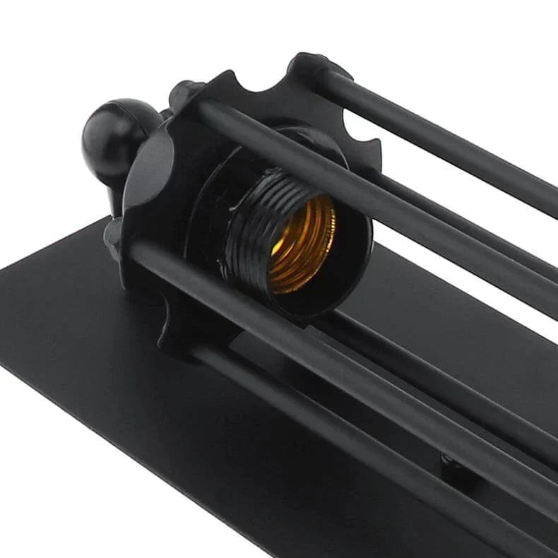 Industriële wandlamp met langwerpige glazen kap