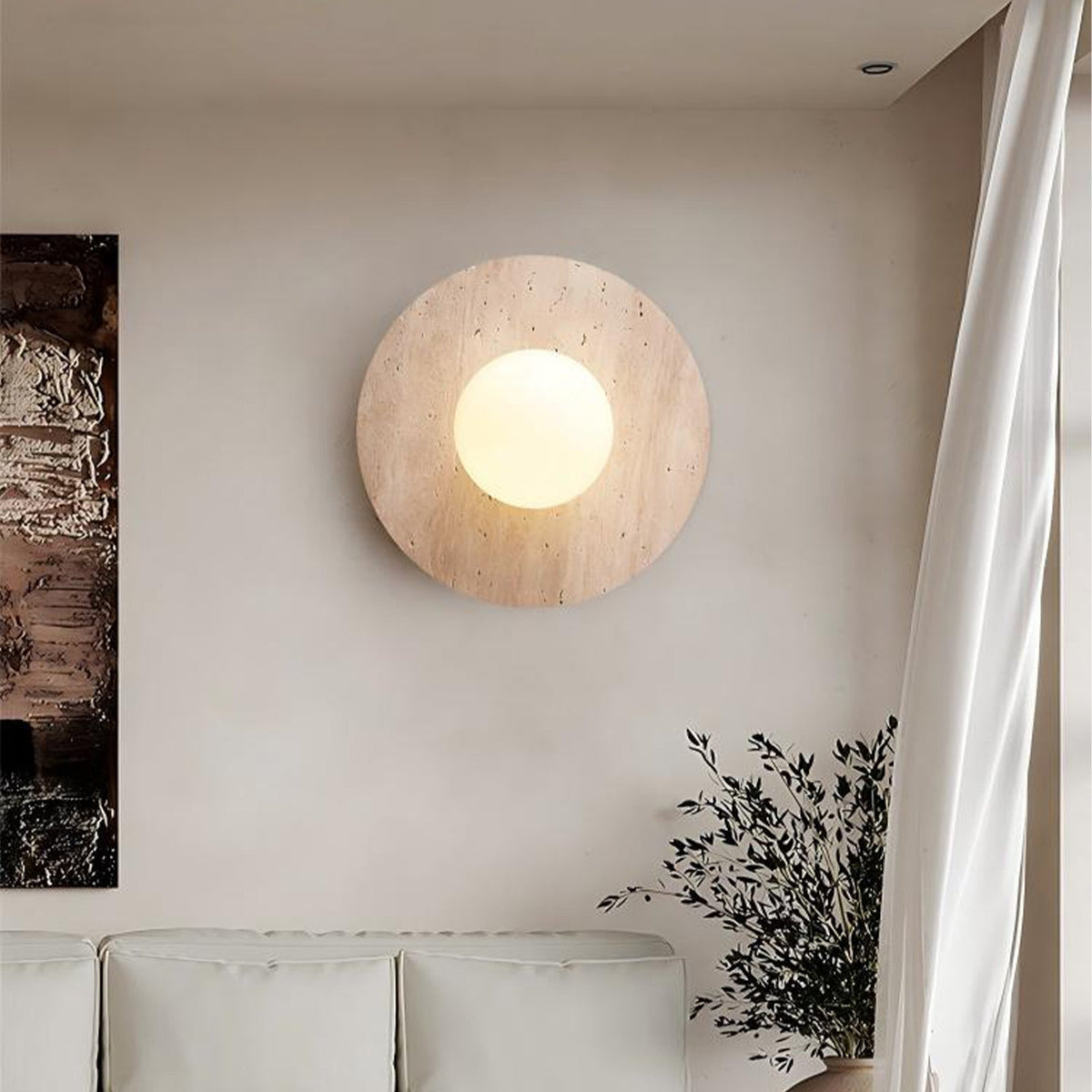 Stenen led-wandlamp boven de spiegel met ronde kap