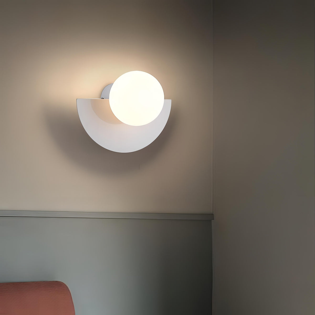 Nordic wall light with a semicircular shade