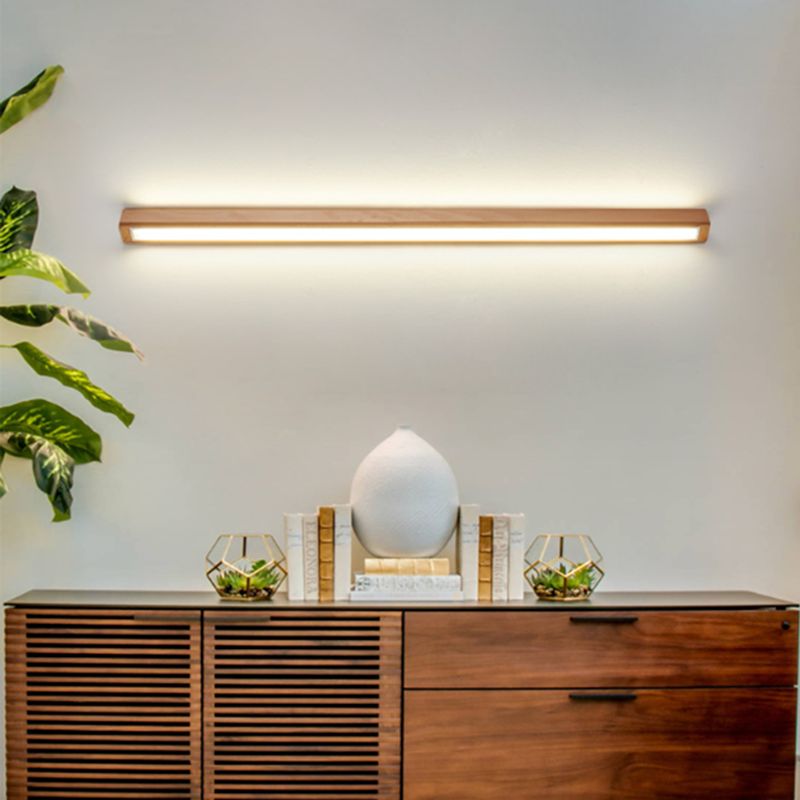Liniowa lampa ścienna nad lustro z drewnianą obudową