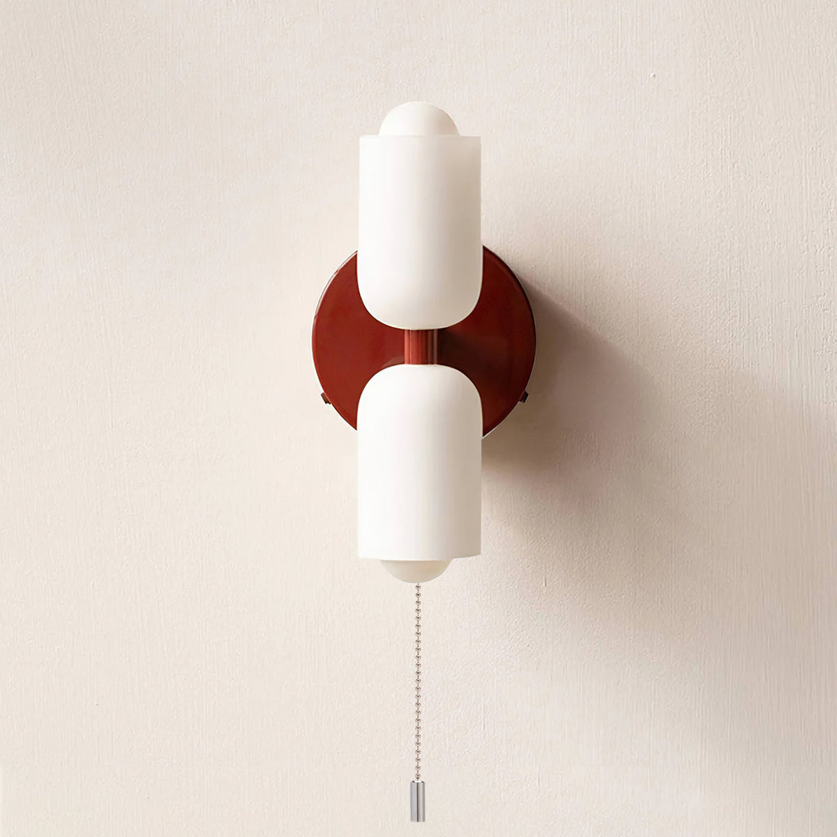 Minimalistische wandlamp met twee cilindrische lampenkappen