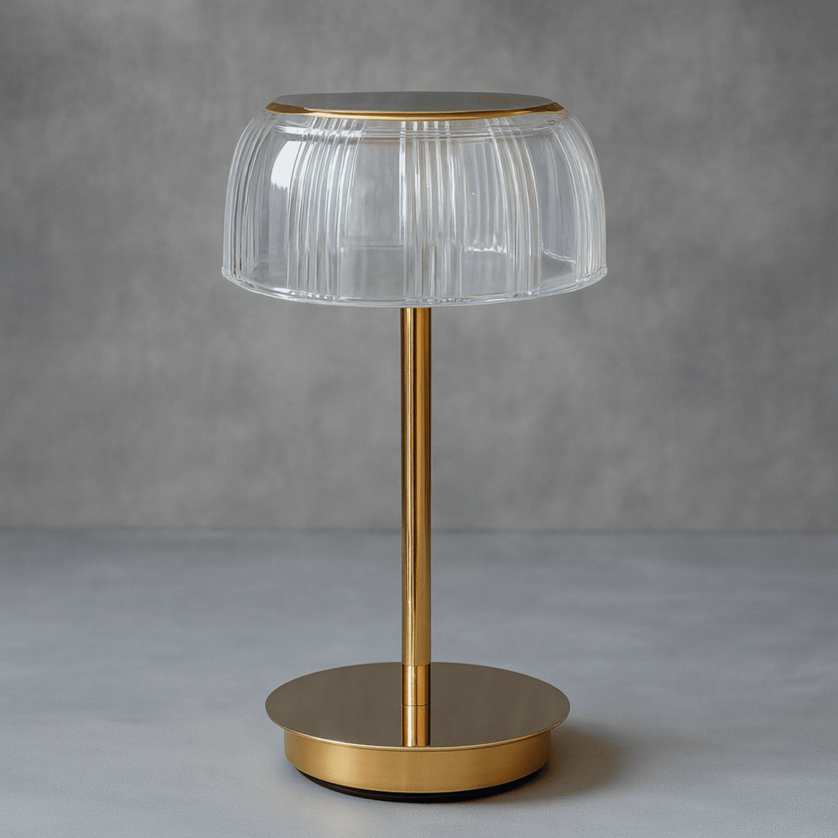 Table lamp with ribbed dome shade and slender stem