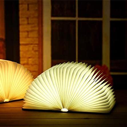 Table lamp shaped like a book with fold-out pages