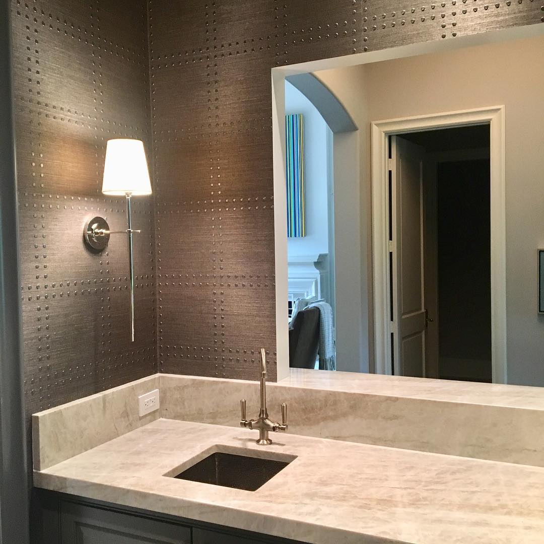Wall lamp with fabric shade and metal arm