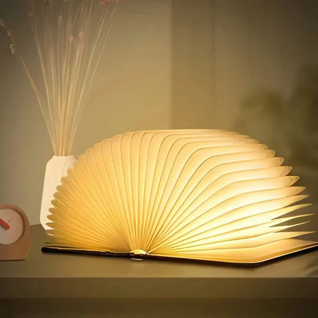 Table lamp shaped like a book with fold-out pages
