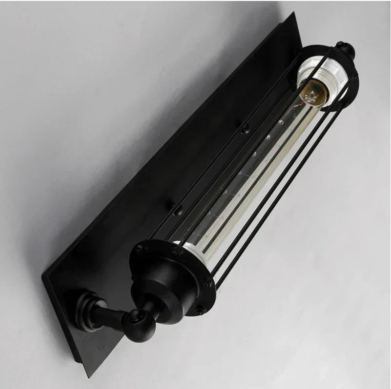 Industriële wandlamp met langwerpige glazen kap