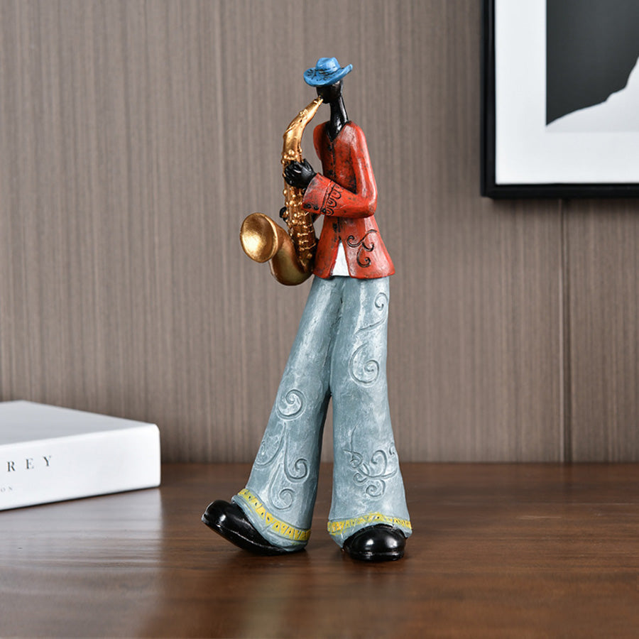 Decorative standing musician figurine made of resin