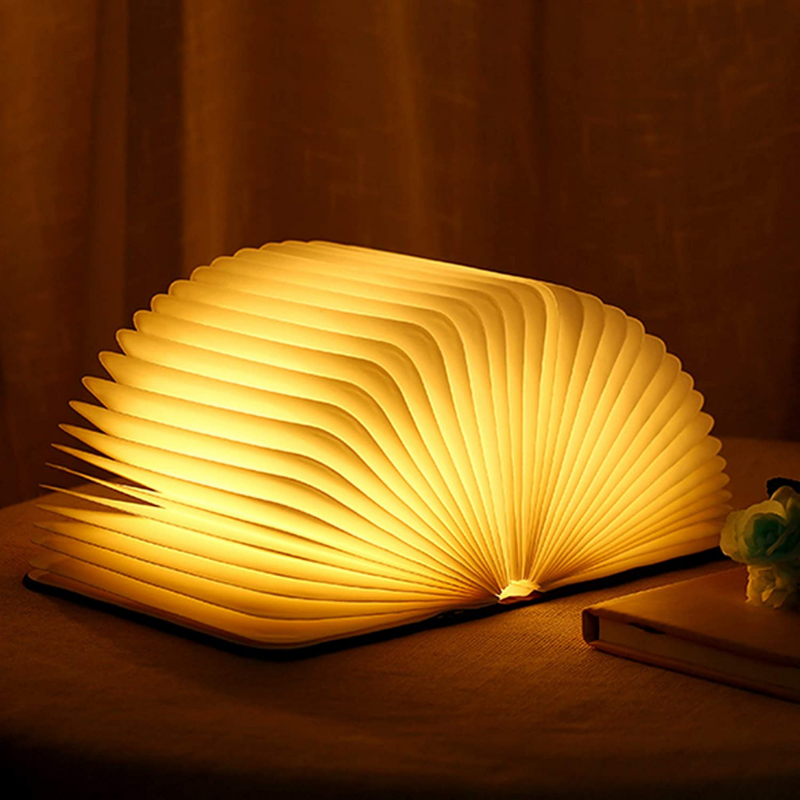Lampa stołowa w kształcie książki z rozkładanymi stronami