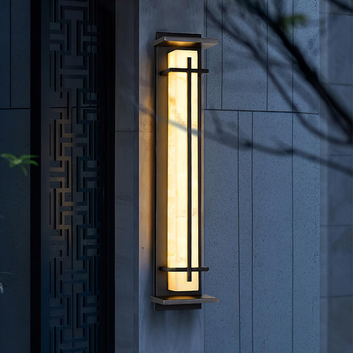 Outdoor wall lamp with a vertical rectangular panel