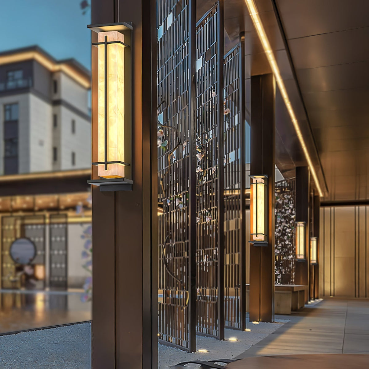 Outdoor wall lamp with a vertical rectangular panel