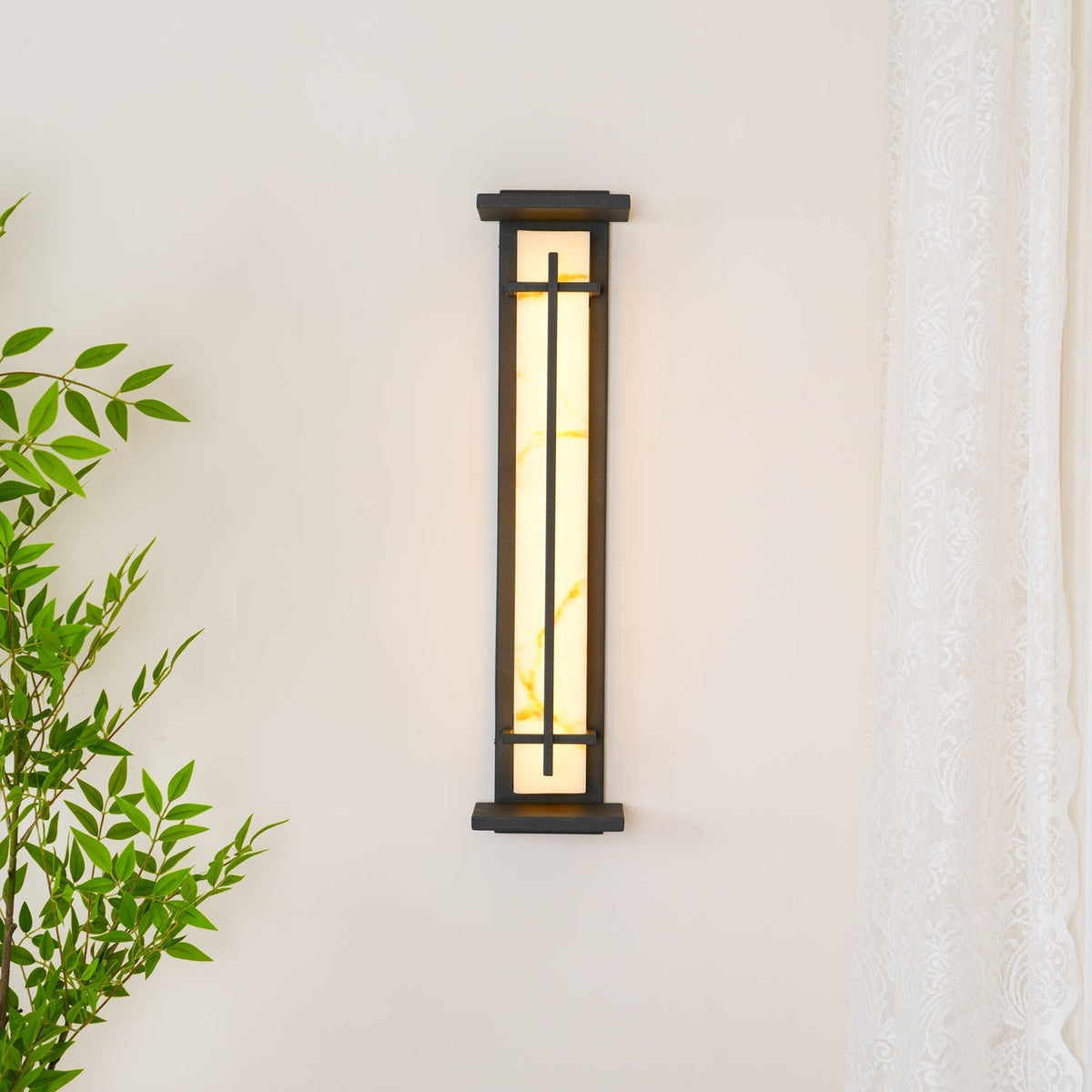 Outdoor wall lamp with a vertical rectangular panel