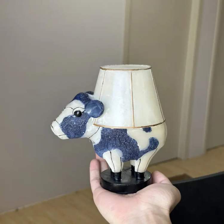 USB rechargeable LED table light with cow motif