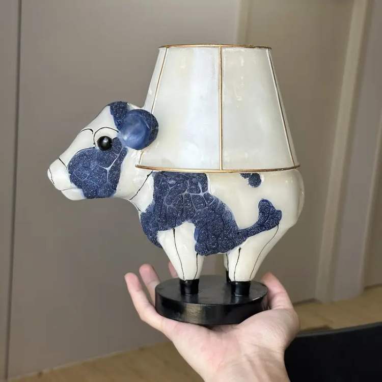 USB rechargeable LED table light with cow motif